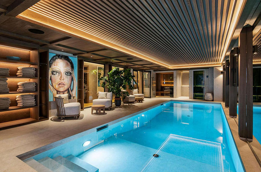 8 chalets d’exception avec piscine intérieure dans les Alpes
